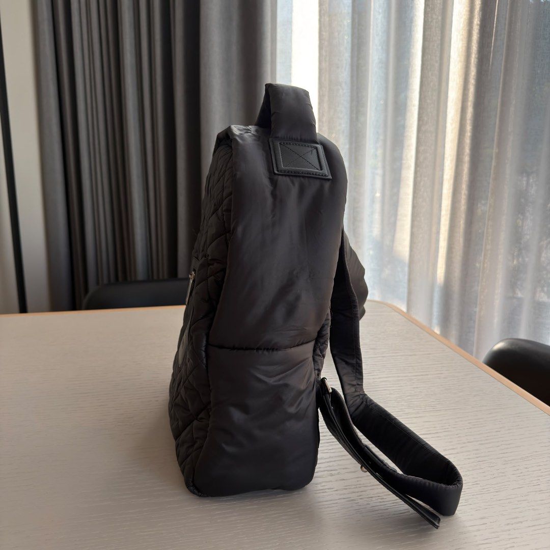 Chanel Coco Cocoon Backpack Small Quilted nylon Black Silver hardware (Category: Bags & Wallets) located in Singapore. Submitted by yasfinds (Listing ID 1456460908, Image 4). Description: Chanel Coco Cocoon Backpack Excellent condition Small L28 H35 D11cm Quilted nylon Black Silver hardware Series 20 (year 2014-2015) Comes with dust bag only F1708 Whats App: Kai @ +65 98263475.
