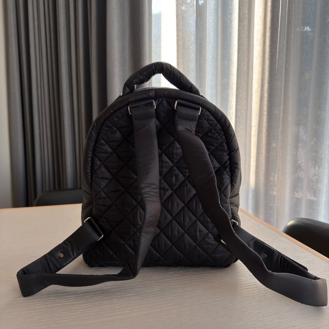 Chanel Coco Cocoon Backpack Small Quilted nylon Black Silver hardware (Category: Bags & Wallets) located in Singapore. Submitted by yasfinds (Listing ID 1456460908, Image 2). Description: Chanel Coco Cocoon Backpack Excellent condition Small L28 H35 D11cm Quilted nylon Black Silver hardware Series 20 (year 2014-2015) Comes with dust bag only F1708 Whats App: Kai @ +65 98263475.