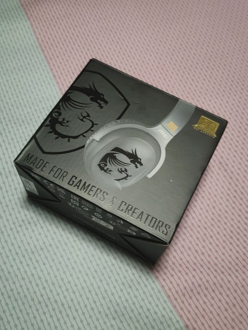 Gaming headset headphone (Category: Headphones & Headsets) located in Singapore. Submitted by ben-10 (Listing ID 1444781037, Image 1). Description: I used this headset for twice only then keep it as I continue to use my old headset. - Condition like new. - MSI H901 GC 20th Anniversary Gaming Headset - USB-C connection for wide compatibility - Ergonomic design with adjustable headband - Soft ear cups for comfort - Hidden microphone - 7.1 Surround 