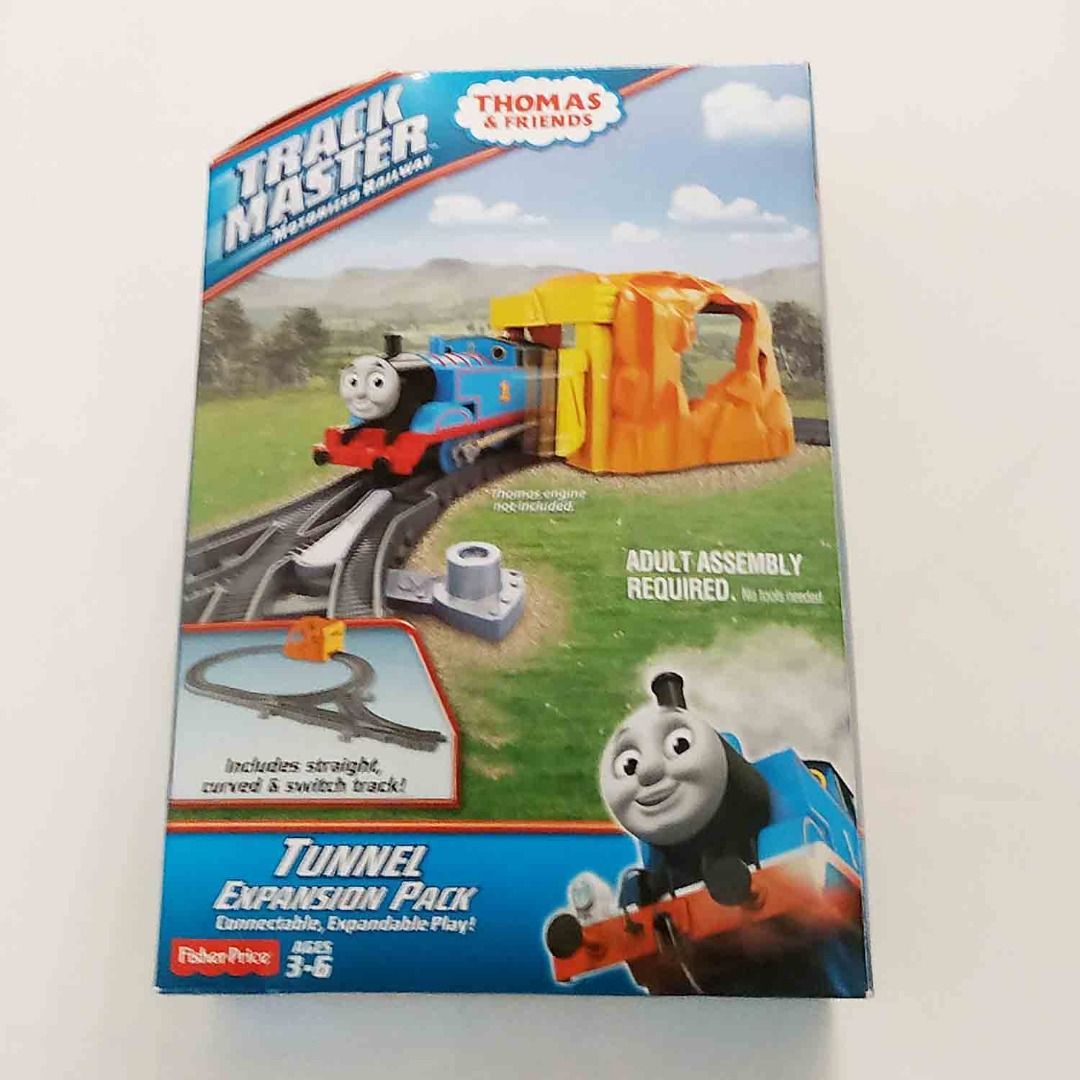 Thomas & Friends TrackMaster, Tunnel Expansion Pack (Category: Kids Toys) located in Singapore. Submitted by memorytoys (Listing ID 1457320370, Image 1). Description: ● Includes straight and curved track pieces with directional switches and tunnel ● Connects to other TrackMaster playsets, track packs and expansion packs (sold separately) ● Includes 2 track adaptors, designed so you can connect the new TrackMaster track to the previous model ● Per