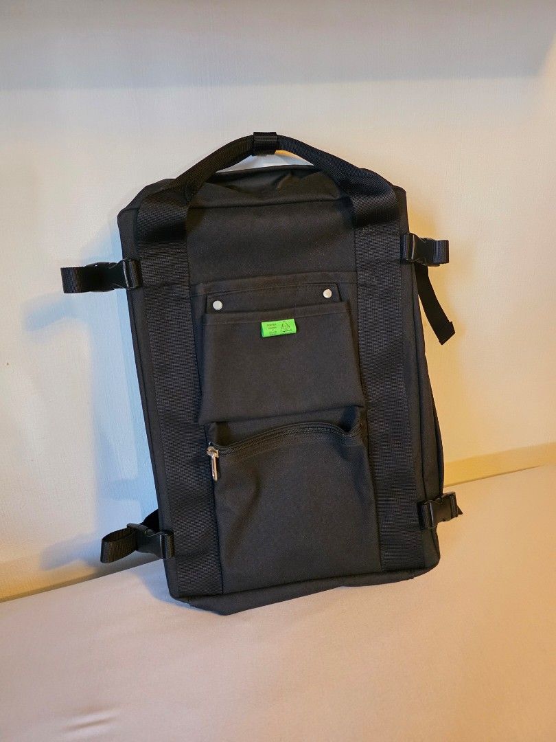 Porter Yoshida & Co. Black Messenger Bag (Category: Sling Bags) located in Singapore. Submitted by lelongahhh (Listing ID 1457226271, Image 1). Description: - Porter-Yoshida & Co. Union Rucksack - Durable, utility-driven backpack inspired by vintage workwear and tool bags. - Key Features: Rugged Fabric: Made from lightweight, tear-resistant polyester canvas. - Workwear Styling: Features distinctive exterior pockets reminiscent of classic tool pou