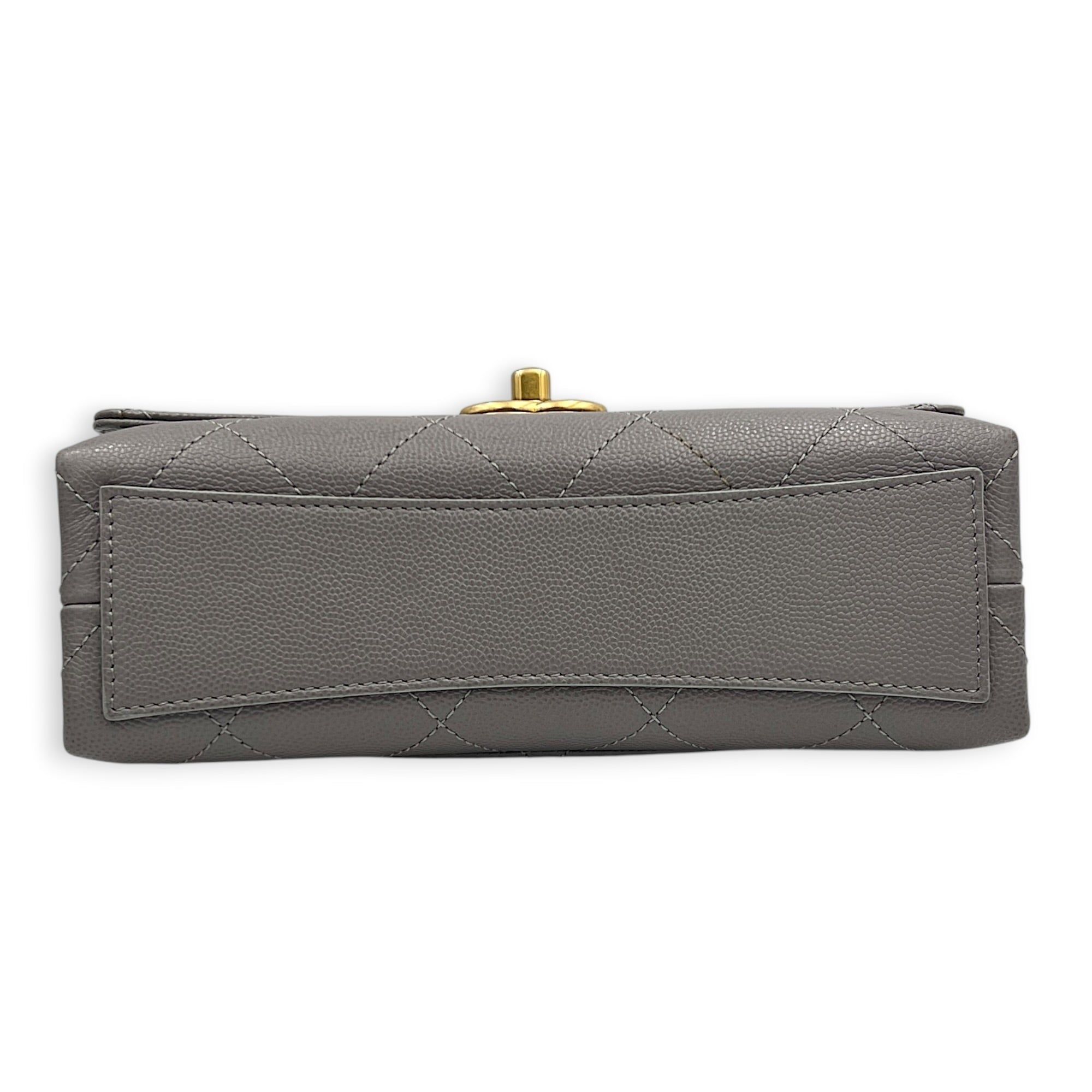 Chanel CC Flap Chain Mini Grey Shoulder Bag in Caviar Leather, Gold hardware (Category: Bags & Wallets) located in Singapore. Submitted by carousellluxury (Listing ID 1457428742, Image 5). Description: SKU S2607-013274AN Material Caviar Leather Size Mini Color Grey Hardware Gold Strap Included, non-detachable Dimension (L)20cmx(H)13cmx(W)6cm Accessories Dust Bag, Original Box, Receipt(s), Care Card, Series NJKH6L72 Circa Est 2021 Microchipped TRU