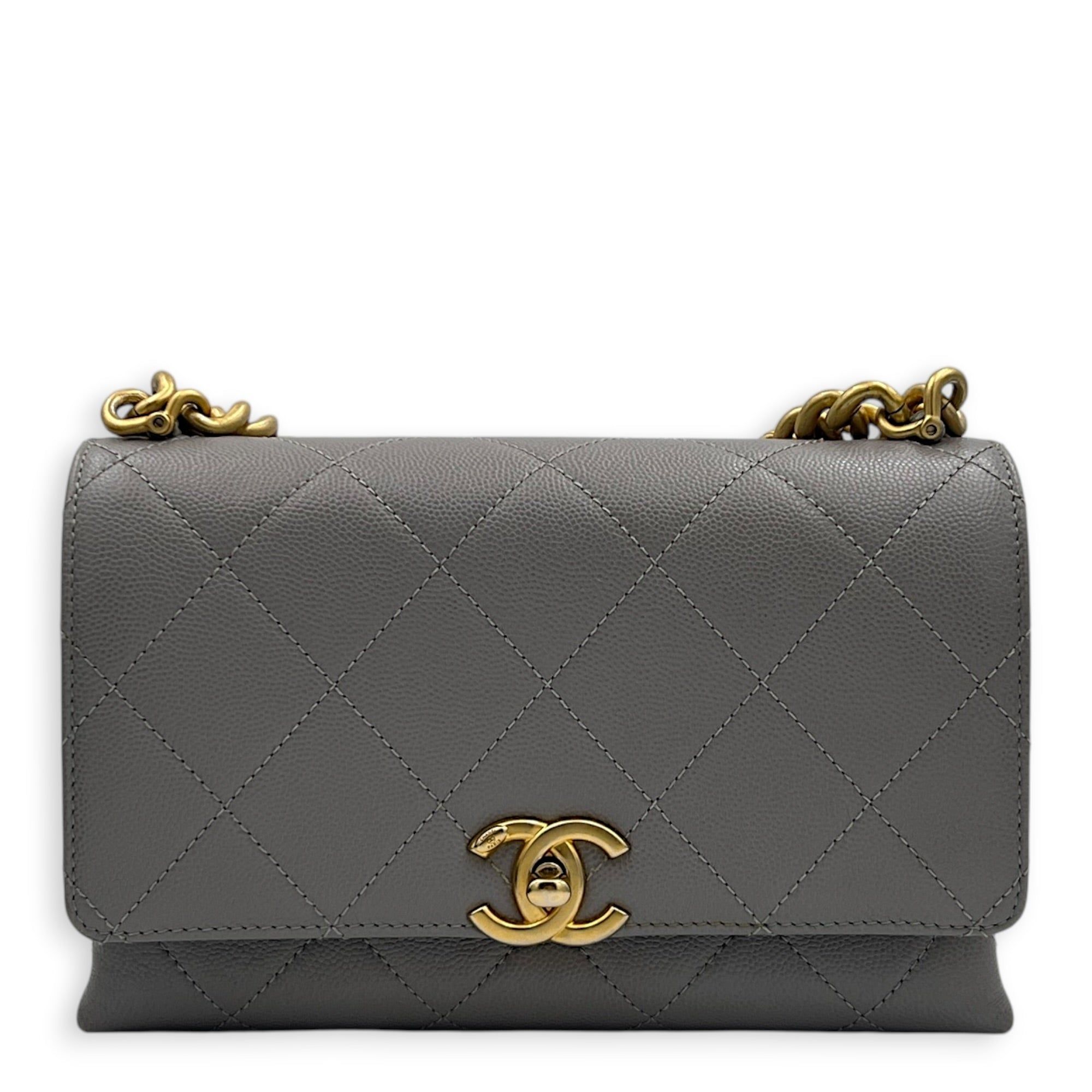 Chanel CC Flap Chain Mini Grey Shoulder Bag in Caviar Leather, Gold hardware (Category: Bags & Wallets) located in Singapore. Submitted by carousellluxury (Listing ID 1457428742, Image 1). Description: SKU S2607-013274AN Material Caviar Leather Size Mini Color Grey Hardware Gold Strap Included, non-detachable Dimension (L)20cmx(H)13cmx(W)6cm Accessories Dust Bag, Original Box, Receipt(s), Care Card, Series NJKH6L72 Circa Est 2021 Microchipped TRU
