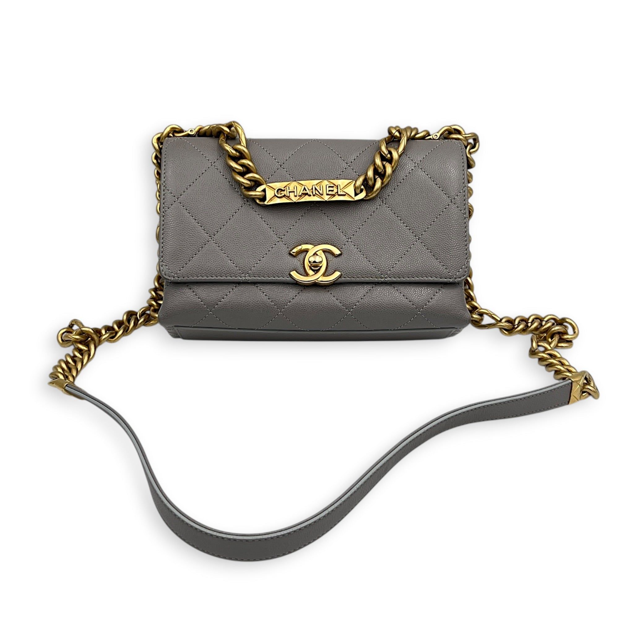 Chanel CC Flap Chain Mini Grey Shoulder Bag in Caviar Leather, Gold hardware (Category: Bags & Wallets) located in Singapore. Submitted by carousellluxury (Listing ID 1457428742, Image 10). Description: SKU S2607-013274AN Material Caviar Leather Size Mini Color Grey Hardware Gold Strap Included, non-detachable Dimension (L)20cmx(H)13cmx(W)6cm Accessories Dust Bag, Original Box, Receipt(s), Care Card, Series NJKH6L72 Circa Est 2021 Microchipped TR