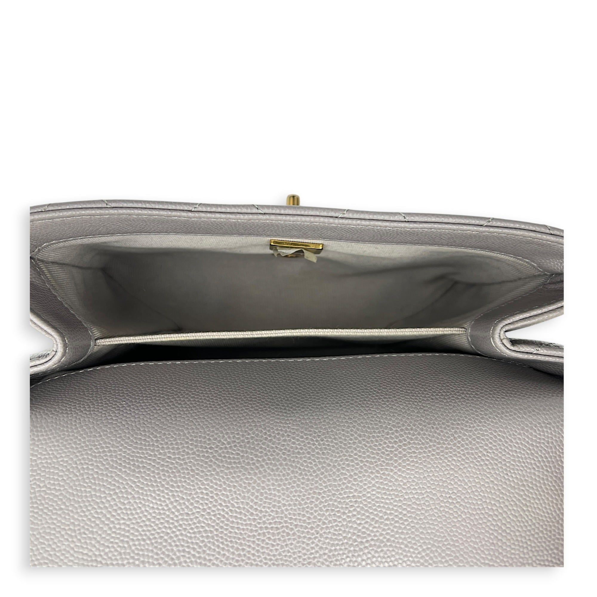 Chanel CC Flap Chain Mini Grey Shoulder Bag in Caviar Leather, Gold hardware (Category: Bags & Wallets) located in Singapore. Submitted by carousellluxury (Listing ID 1457428742, Image 6). Description: SKU S2607-013274AN Material Caviar Leather Size Mini Color Grey Hardware Gold Strap Included, non-detachable Dimension (L)20cmx(H)13cmx(W)6cm Accessories Dust Bag, Original Box, Receipt(s), Care Card, Series NJKH6L72 Circa Est 2021 Microchipped TRU