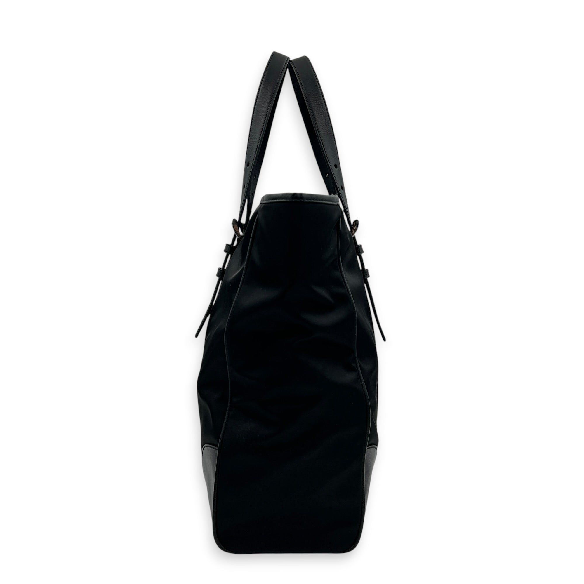Prada Logo Tote Bag Black in Nylon, Silver hardware (Category: Bags & Wallets) located in Singapore. Submitted by carousellluxury (Listing ID 1457432892, Image 3). Description: SKU C2607-013350AN Material Nylon Color Black Hardware Silver Strap Not Included Dimension (L)40cm x (H)35cm x (W)12cm Accessories Authentication Card, Care Card, Dust Bag, Series 31 3 Circa Est 2009 Microchipped FALSE Condition - Surface: In very good condition overall - 