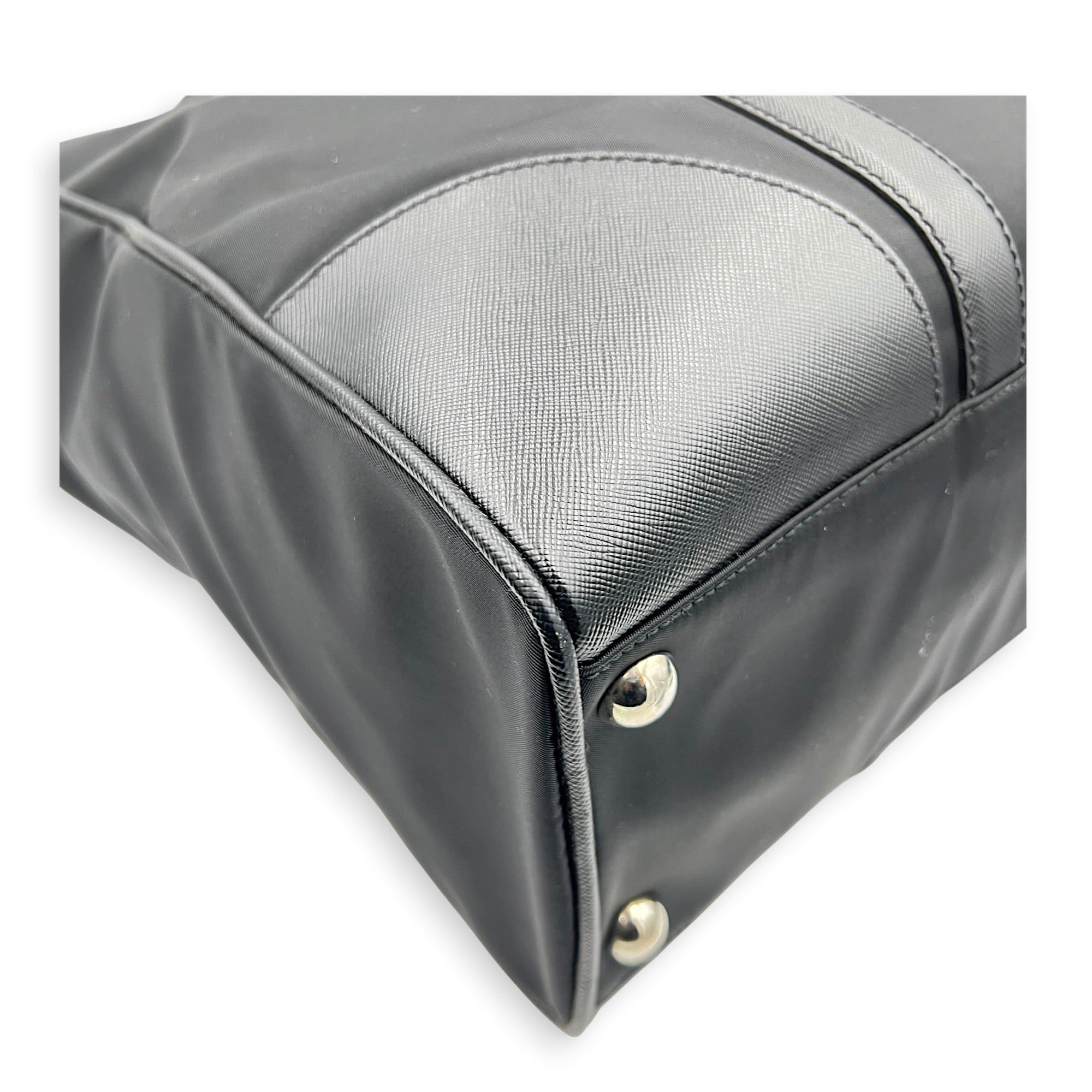 Prada Logo Tote Bag Black in Nylon, Silver hardware (Category: Bags & Wallets) located in Singapore. Submitted by carousellluxury (Listing ID 1457432892, Image 7). Description: SKU C2607-013350AN Material Nylon Color Black Hardware Silver Strap Not Included Dimension (L)40cm x (H)35cm x (W)12cm Accessories Authentication Card, Care Card, Dust Bag, Series 31 3 Circa Est 2009 Microchipped FALSE Condition - Surface: In very good condition overall - 