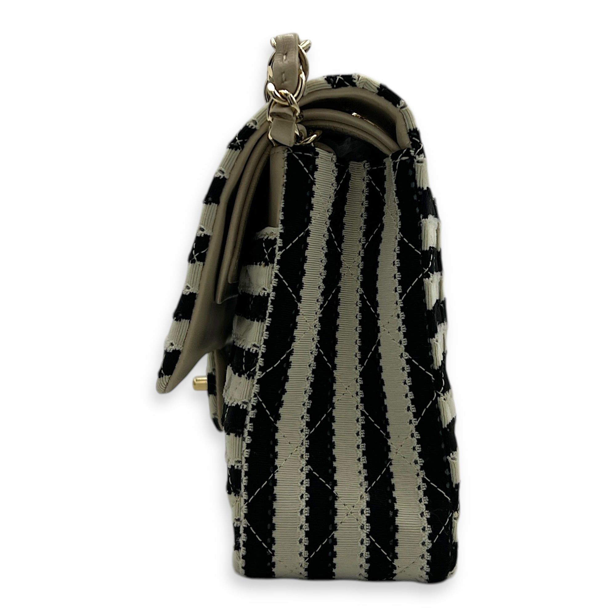 Chanel Coco Sailor Flap 25 Black and White Shoulder Bag in Jersey, Silver hardware (Category: Bags & Wallets) located in Singapore. Submitted by carousellluxury (Listing ID 1428744147, Image 4). Description: SKU S2603-010617LL Material Jersey Size 25 Color Black and White Hardware Silver Strap Not Included Dimension (L)25cm x (H)15cm x (W)6cm Accessories Dust Bag, Series 19196344 Circa Est 2014 Microchipped FALSE Condition - Surface: In very good