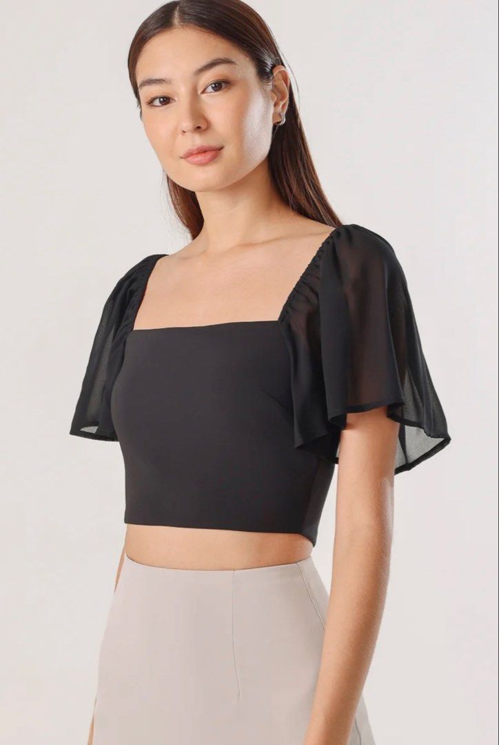 LOVET Sherrine Chiffon Flutter Top (Category: Blouses) located in Singapore. Submitted by jxx_28 (Listing ID 1457602399, Image 1). Description: Worn only twice RTP $34.90.