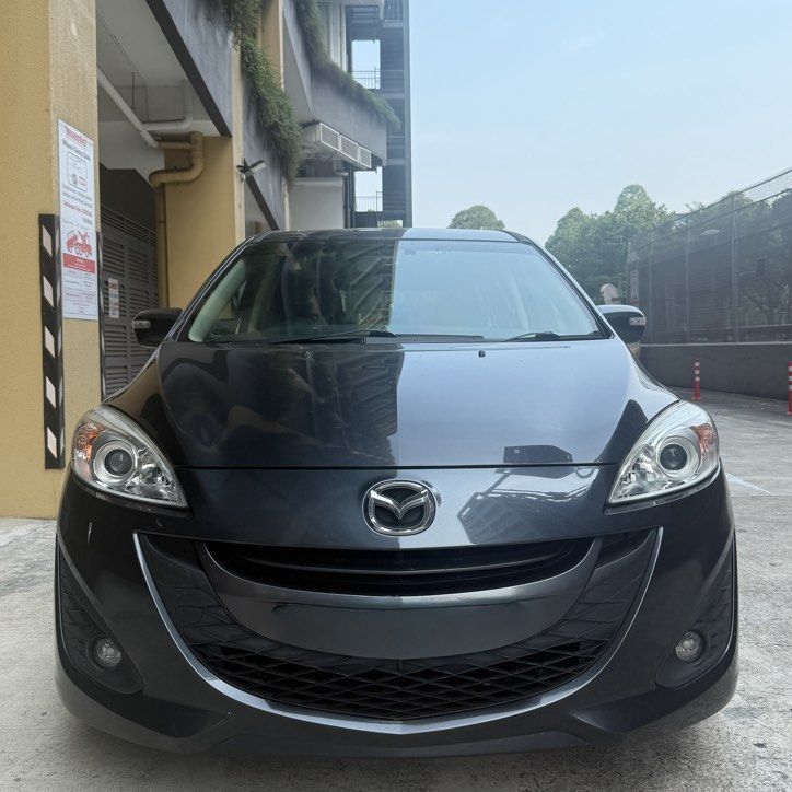Mazda 5 Sunroof 7 Seater MPV for RENT / LEASE / GRAB / PHV (Category: Car Rental) located in Singapore. Submitted by spherecarsleasing (Listing ID 1457594786, Image 1). Description: Mazda 5 7-Seater 🚐 ✔ Sliding doors – easy entry/exit ✔ Spacious for passengers or cargo ✔ Smooth & fuel-efficient drive ✔ Ideal for PHV / family use ✅ Low Deposit Amount ✅ 24hr Towing Service & Assistance ✅ Unlimited Mileage Packages Included: 🚙 Servicing & Maintena