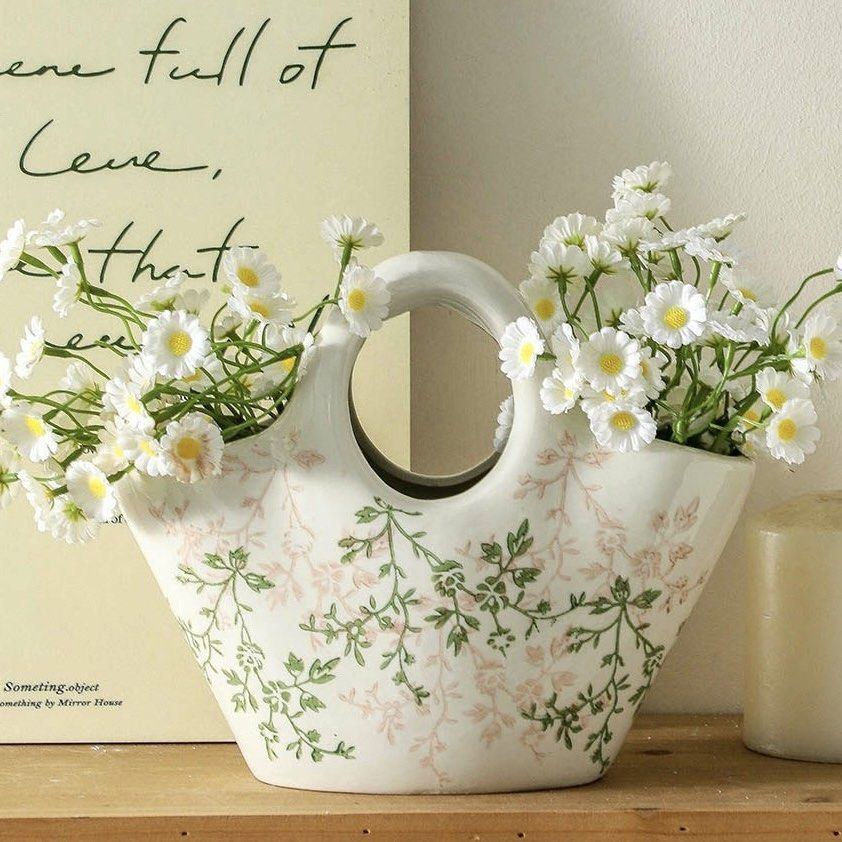 Beautiful ceramic bag vase - 24cm x 18.8cm (Category: Vases & Decorative Bowls) located in Singapore. Submitted by bamboolifestyle888 (Listing ID 1457901981, Image 1). Description: 1 for $35, 2 for $60 .
