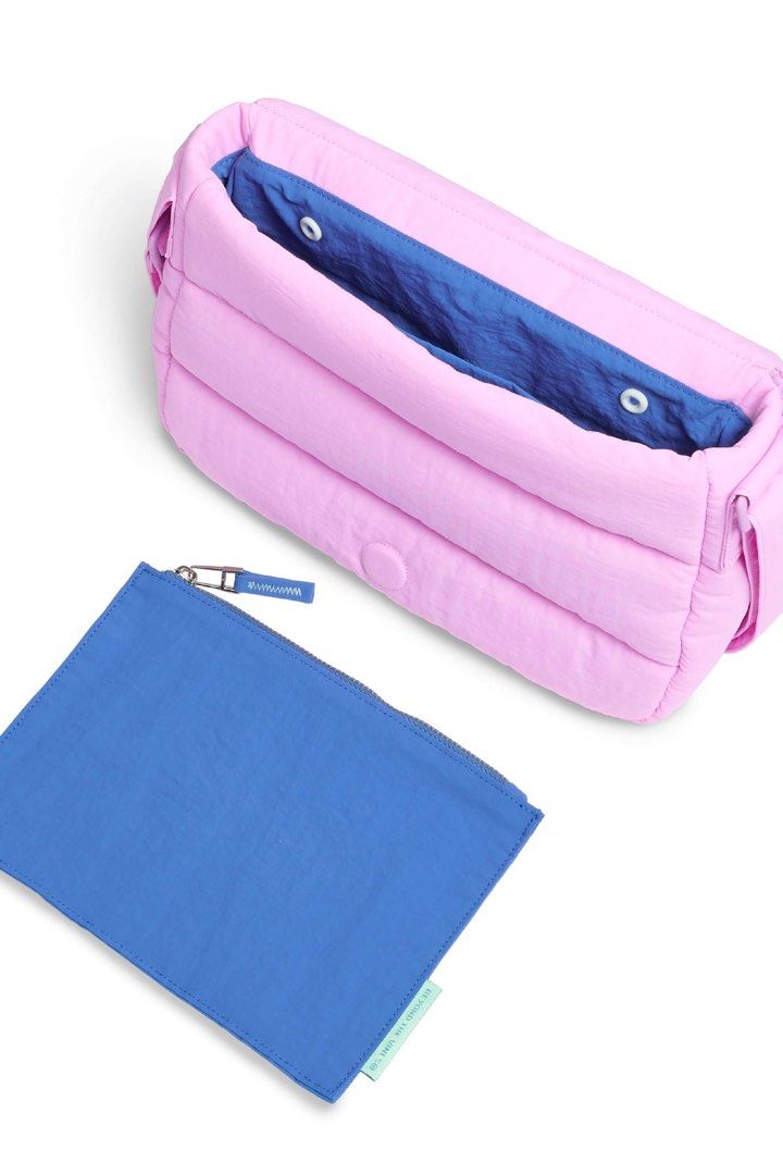 Beyond The Vines Puffer Bag Pink (Category: Cross-body Bags) located in Singapore. Submitted by wholeinone (Listing ID 1457841524, Image 2). Description: BTV poofy back (color abit faded) - Does not include the blue pouch - $12 (+$3 tracked mail).