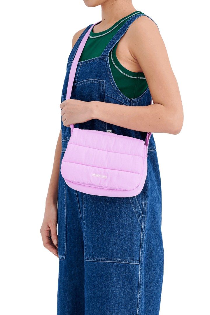 Beyond The Vines Puffer Bag Pink (Category: Cross-body Bags) located in Singapore. Submitted by wholeinone (Listing ID 1457841524, Image 1). Description: BTV poofy back (color abit faded) - Does not include the blue pouch - $12 (+$3 tracked mail).
