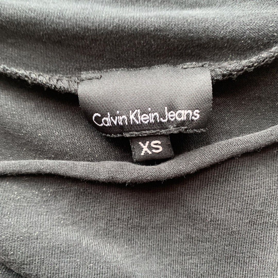 CALVIN KLEIN Rhinestoned Mockneck y2k (Category: Sleeveless) located in Singapore. Submitted by m.rchives (Listing ID 1457799871, Image 3). Description: Measurements : PTP - 40cm Length Down - 56cm View physically at Dirty Laundry Vintage, #03-46, Queenstown Shopping Centre :).