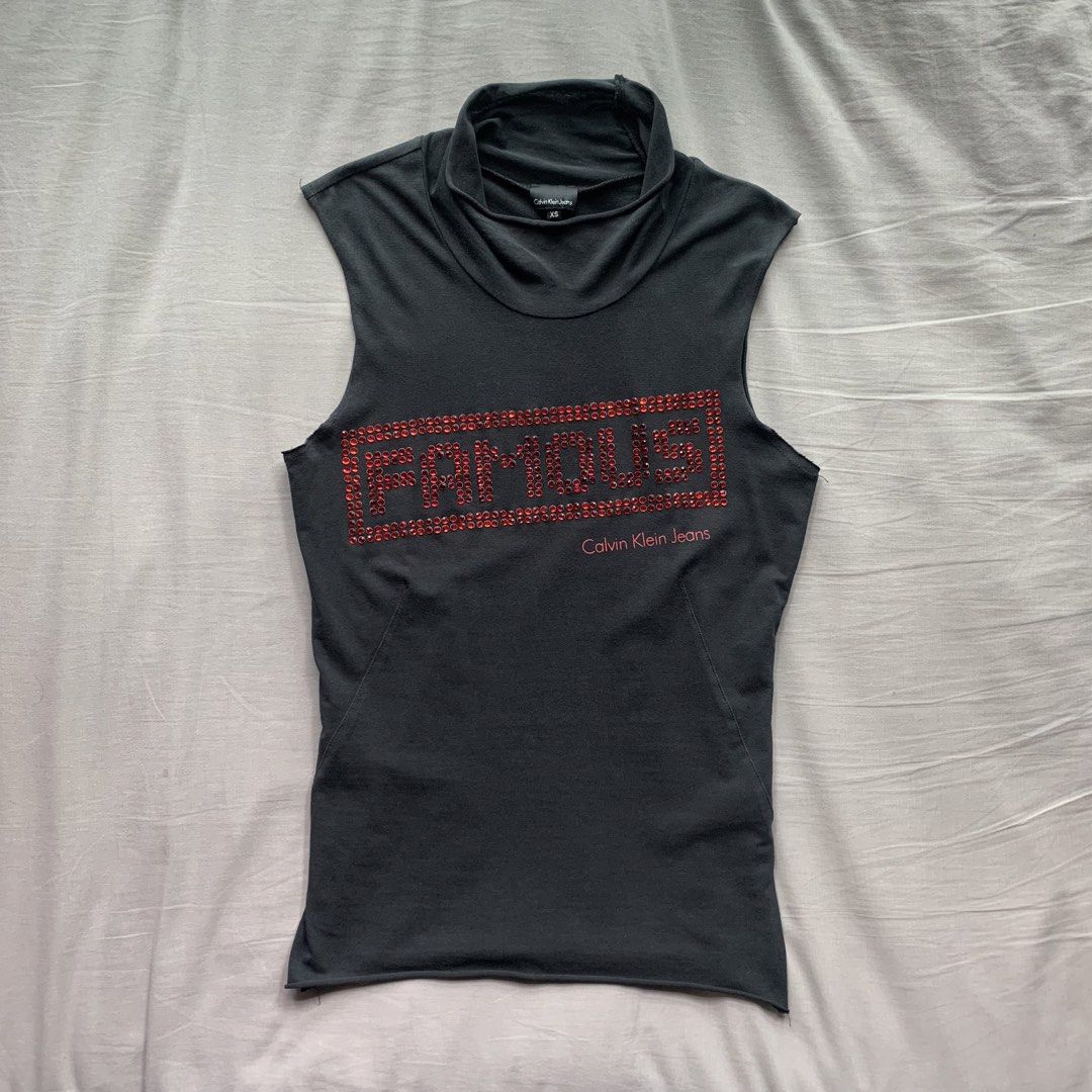 CALVIN KLEIN Rhinestoned Mockneck y2k (Category: Sleeveless) located in Singapore. Submitted by m.rchives (Listing ID 1457799871, Image 1). Description: Measurements : PTP - 40cm Length Down - 56cm View physically at Dirty Laundry Vintage, #03-46, Queenstown Shopping Centre :).