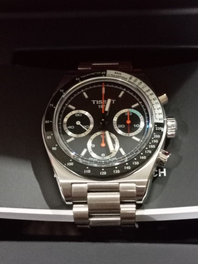 Tissot PR516 Mechanical Chronograph 41mm Watch (Category: Men's Watches) located in Singapore. Submitted by eurasianlynx88888 (Listing ID 1450180727, Image 7). Description: - Tissot PR516 Mechanical Chronograph come with box - 41mm Stainless Steel Case - Stainless Steel Bracelet - Black Dial with Orange Accents - Chronograph Functionality - See-Through Case Back - Slight negotiation only - Watch condition like new no scratch as seldom wear, watch