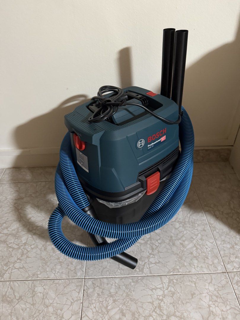 Bosch Professional GAS 15 Wet Dry Vacuum Cleaner (Category: Vacuum Cleaner & Housekeeping) located in Singapore. Submitted by the.minimalist.sg (Listing ID 1458023627, Image 1). Description: - Bosch Professional GAS 35 Wet/Dry Vacuum Cleaner - Powerful suction for both wet and dry messes - Includes hose and two extension tubes - Ideal for workshops or home use - Ready for pickup.