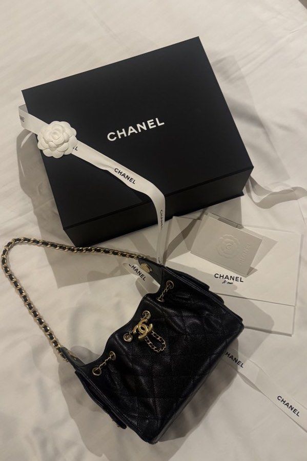 Chanel 25 Mini Hobo Bag in Black Caviar and AGHW (Category: Bags & Wallets) located in Singapore. Submitted by shopflux (Listing ID 1448419272, Image 1). Description: In Caviar and aged gold hardware (highly sought combo) Full Set - Mar 2026 Bought from Japan boutique Microchipped Used twice lightly only Condition: 10/10 like new condition Can fit a lot stuff even though it’s mini size and suits many occasions, classic piece! Comes with: Full set