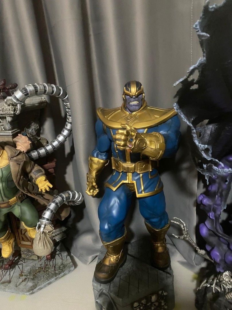 Marvel Thanos Action Figure with Infinity Gauntlet (Category: Toy Figures) located in Singapore. Submitted by swiftstone.c1bb35 (Listing ID 1457909379, Image 1). Description: - Thanos action figure - Iconic blue and gold suit - Infinity Gauntlet on left hand - Detailed display base included - Ideal for Marvel fans and collectors.