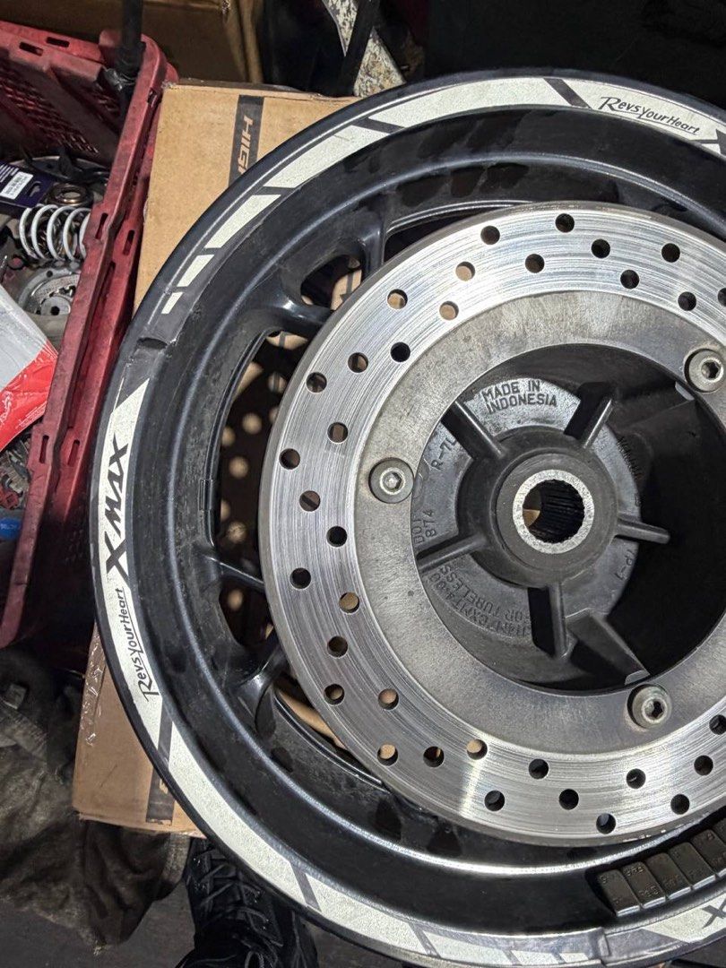 XMAX stock rim (Category: Motorcycle Accessories) located in Singapore. Submitted by s_xuan (Listing ID 1458041609, Image 8). Description: - Genuine XMAX stock rim - Includes brake disc - Ready for installation - Disc and tyres not included no major scratches on the outside rims are at workshop (lianhupsengkee) for easy installation.