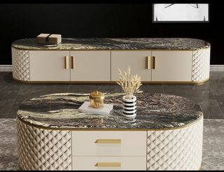 . Oval Coffee Table and TV Console Set. Beautiful looking set. Brand new Luxury Marble Top Coffee Table and TV Console Set. Natural marble. Selling bcoz its too big for my hall. Bought for $4980. Selling only $2499. Negotiable