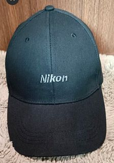Nikon Cap. Postage cost shown below 👇