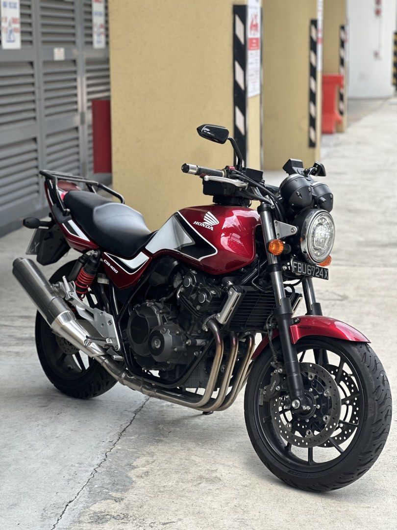 HONDA SUPER REVO CB400 REVO 3 COE FEB 2033| CB400X | CB350 | CB400 REVO 1 REVO 2 REVO 3 YOSHIMURA BLUEFLAME (Category: Class 2A) located in Singapore. Submitted by creation.motorworld (Listing ID 1453784827, Image 2). Description: PRE OWNED BIKE $25,500 HONDA CB400 REVO 3 COE FEB 2033 (Renewable) Almost New Engine. Low Mileage 6000+ This Model Needs No Introduction! Proven Bullet Prove Engine. Option to add Spec A Exhaust ! 💯% transparency to pr