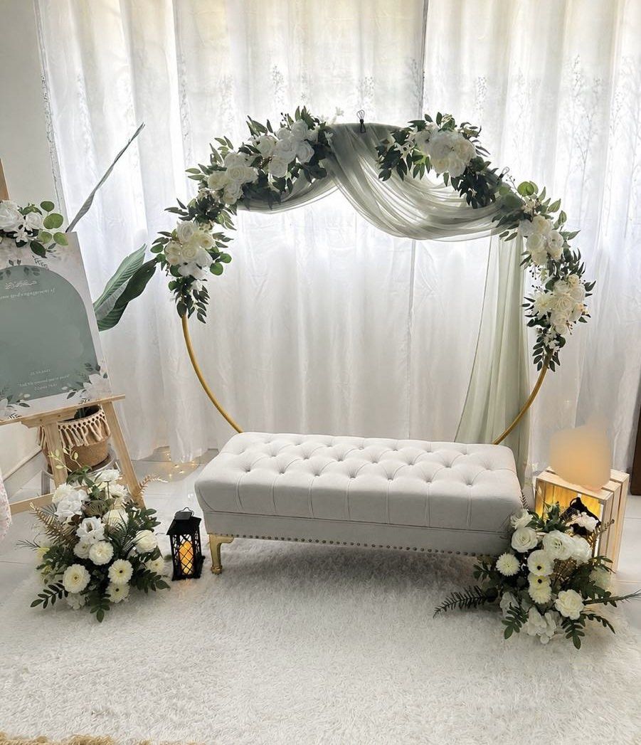 Rental Decor|1.6M Gold Round Arch |Faux Flowers|Sage Curtain Drape|Fairy lights|White Fluffy Carpet|Candles (Category: Occasions & Party Supplies) located in Singapore. Submitted by _mirdee (Listing ID 1457772904, Image 1). Description: Create an elegant and simple DIY setup with our 1.6m Gold Round Arch in the most affordable way! 🌿✨ 1 day rental - $13 2 to 3 days - $22 Elevate your decor with: Beautiful white and green arch faux flowers availa