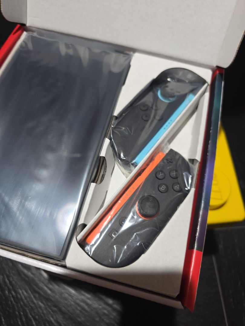 Not Full Set - Brand New Local SG Nintendo Switch 2 Console + Joy-Con + Box (Category: Nintendo) located in Singapore. Submitted by iamewok (Listing ID 1458544562, Image 3). Description: Swipe for more pixs, no warranty, no games, no mem card, no dock, no grip, no hdmi cable, no charger. Brand new local set, never been charged or use, listing include the switch 2 console, joy-con and box. Asking price and collection venue are fixed. Courier deliv