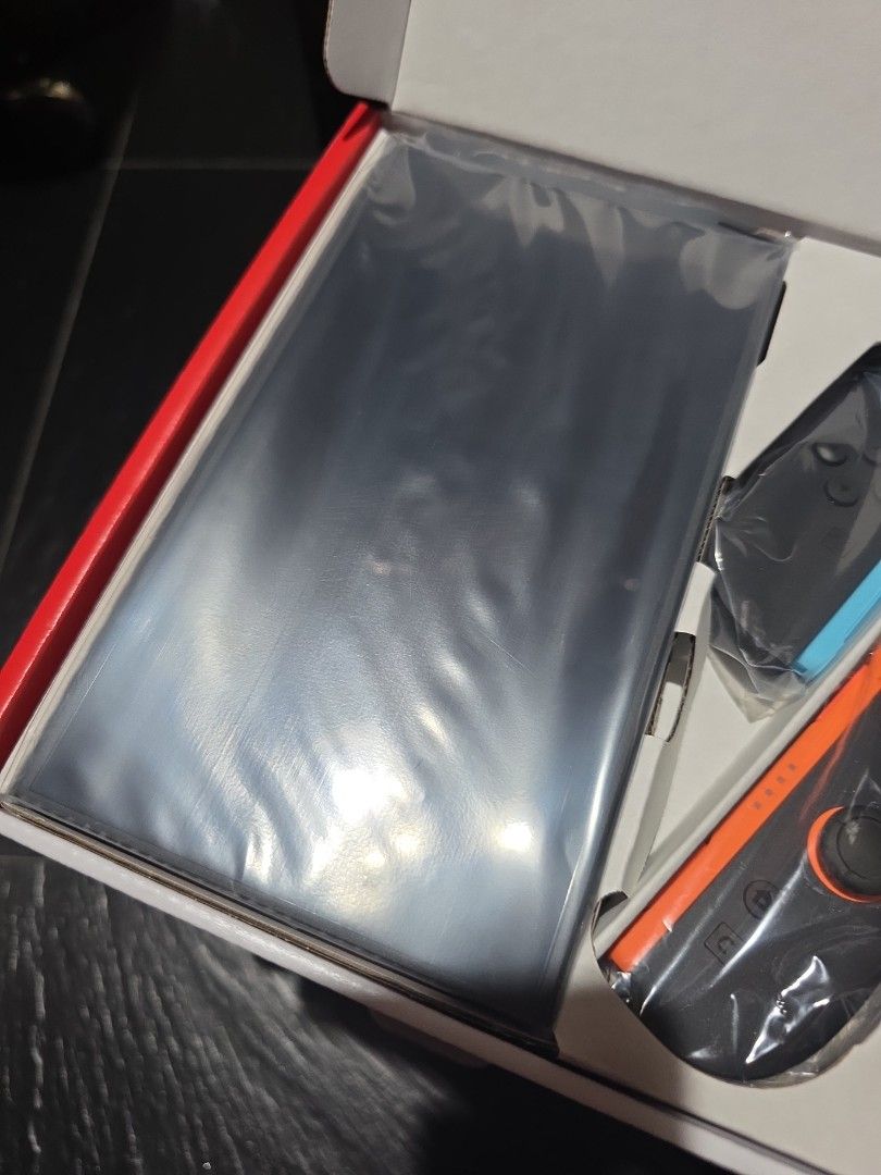 Not Full Set - Brand New Local SG Nintendo Switch 2 Console + Joy-Con + Box (Category: Nintendo) located in Singapore. Submitted by iamewok (Listing ID 1458544562, Image 2). Description: Swipe for more pixs, no warranty, no games, no mem card, no dock, no grip, no hdmi cable, no charger. Brand new local set, never been charged or use, listing include the switch 2 console, joy-con and box. Asking price and collection venue are fixed. Courier deliv