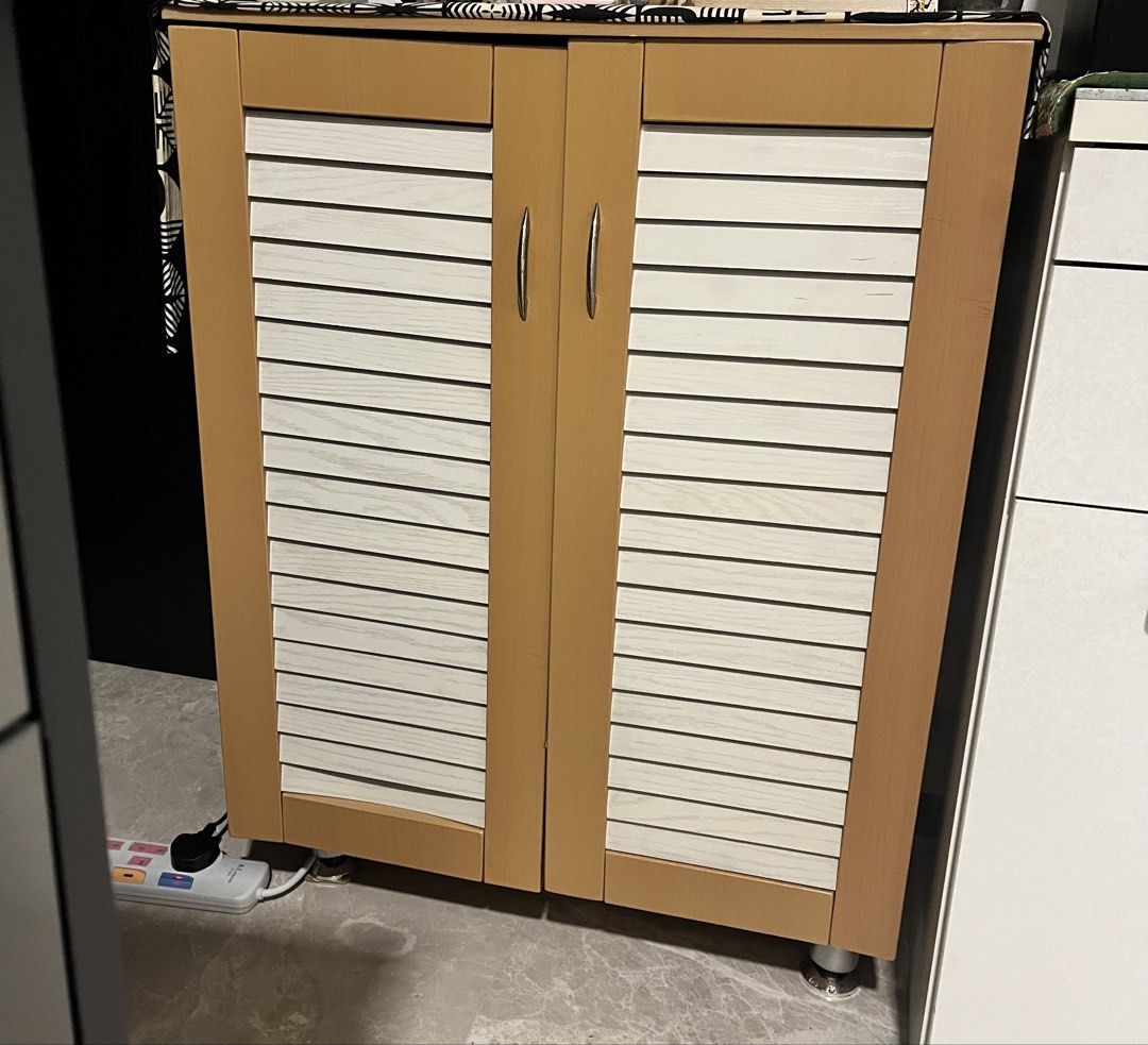 (FREE) Wooden Shoe Cabinet with Louvered Doors (Category: Shelves, Cabinets & Racks) located in Singapore. Submitted by maorican (Listing ID 1458806835, Image 1). Description: Moving out sale - Stylish wooden shoe cabinet - Features 2 louvered doors for ventilation - Multiple shelves inside for ample shoe storage - Practical dimensions: 67.5cm (W) x 32.5cm (D) x 89cm (H) - Pick up from my place near Botanic garden MRT by 8 Sept - If you need deli