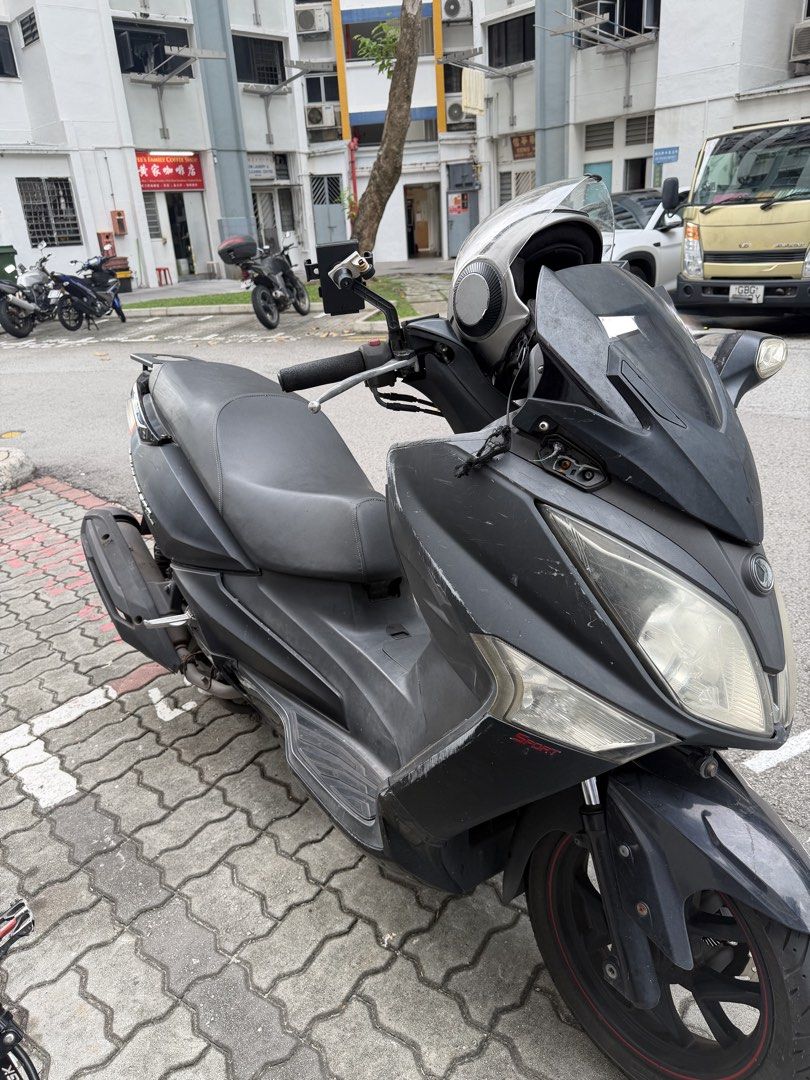 SYM JOYMAX 300i (Category: Class 2A) located in Singapore. Submitted by msuhail_11 (Listing ID 1453723634, Image 1). Description: Great bike but there are some issues with it now. Have to repair it on your end & ride on. Just changed belting system on July 2026 Main issues: - No right mirror - Coolant leak issue COE: 2027 Dec PM for more details .