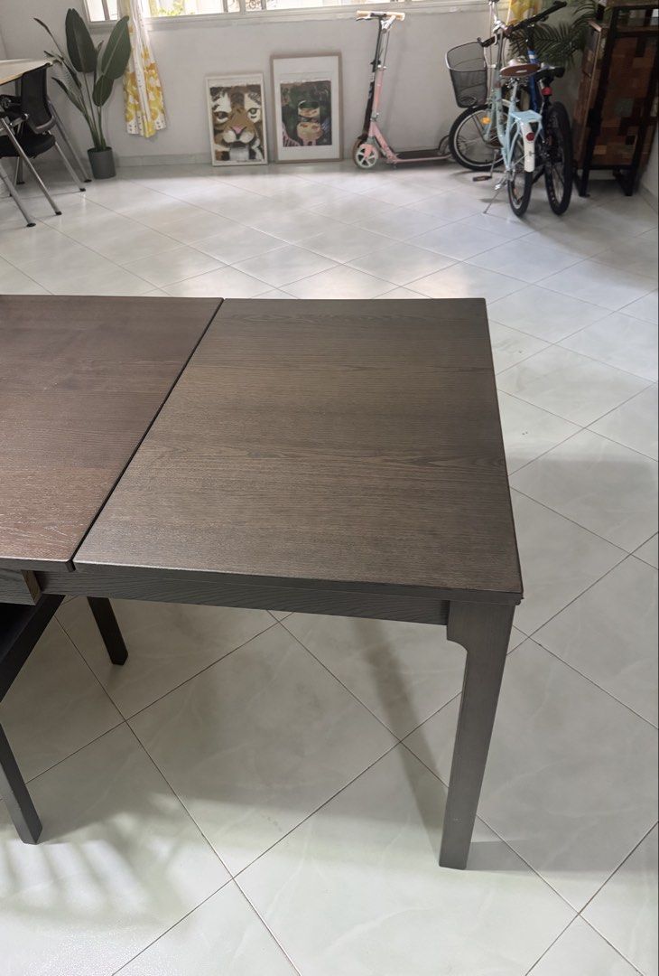Extendable dining table (Category: Tables & Sets) located in Singapore. Submitted by ahazombroden (Listing ID 1453870135, Image 5). Description: Easily extendable dining table can sit up to 10 ppl when extended Length:180cm (extended 240cm) Breadth: 90cm Height: 75cm Self collect and self arrange delivery Can nego.