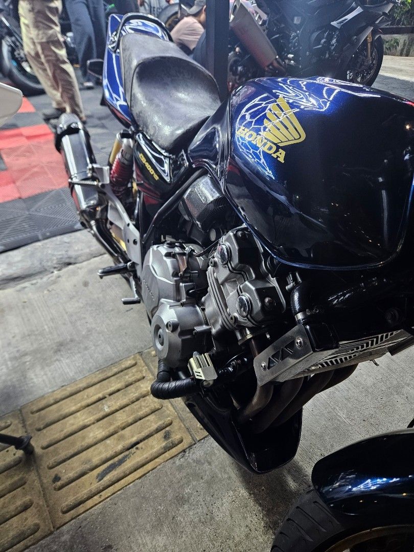 CB400 midnight blue with yoshimura exhaust (Category: Everything Else) located in Singapore. Submitted by willormight (Listing ID 1454605658, Image 7). Description: Selling my CB400 in midnight blue COE Dec 2027 Kindly go through my previous listing for further details. Negotiable, if price met will pass along the stock exhaust, spare batik wrapped flat custom seat, spare FI covers and ORI signal lights x2. tags: Super 4 S4 s4 super4 cb400 revo 1