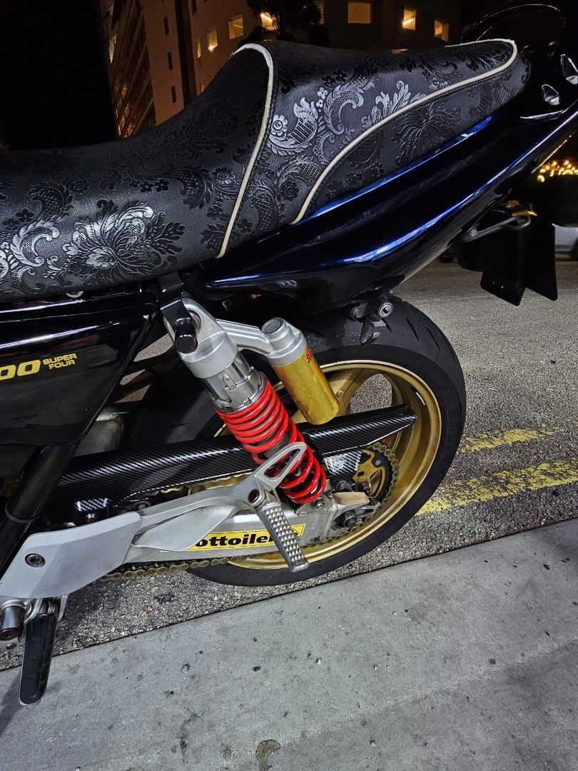 CB400 midnight blue with yoshimura exhaust (Category: Everything Else) located in Singapore. Submitted by willormight (Listing ID 1454605658, Image 3). Description: Selling my CB400 in midnight blue COE Dec 2027 Kindly go through my previous listing for further details. Negotiable, if price met will pass along the stock exhaust, spare batik wrapped flat custom seat, spare FI covers and ORI signal lights x2. tags: Super 4 S4 s4 super4 cb400 revo 1