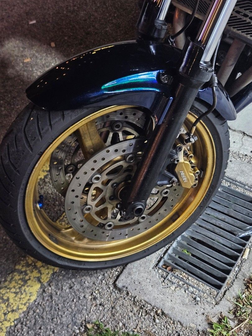 CB400 midnight blue with yoshimura exhaust (Category: Everything Else) located in Singapore. Submitted by willormight (Listing ID 1454605658, Image 4). Description: Selling my CB400 in midnight blue COE Dec 2027 Kindly go through my previous listing for further details. Negotiable, if price met will pass along the stock exhaust, spare batik wrapped flat custom seat, spare FI covers and ORI signal lights x2. tags: Super 4 S4 s4 super4 cb400 revo 1