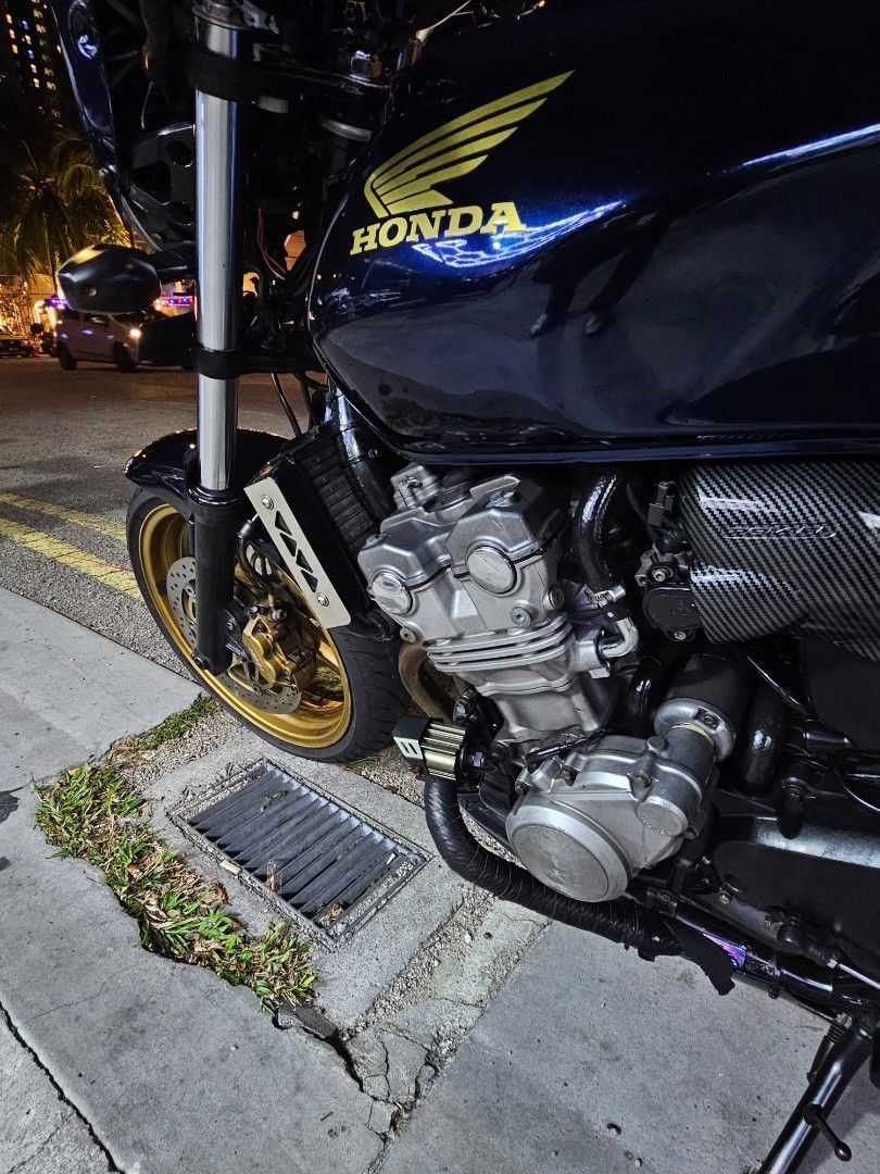 CB400 midnight blue with yoshimura exhaust (Category: Everything Else) located in Singapore. Submitted by willormight (Listing ID 1454605658, Image 2). Description: Selling my CB400 in midnight blue COE Dec 2027 Kindly go through my previous listing for further details. Negotiable, if price met will pass along the stock exhaust, spare batik wrapped flat custom seat, spare FI covers and ORI signal lights x2. tags: Super 4 S4 s4 super4 cb400 revo 1