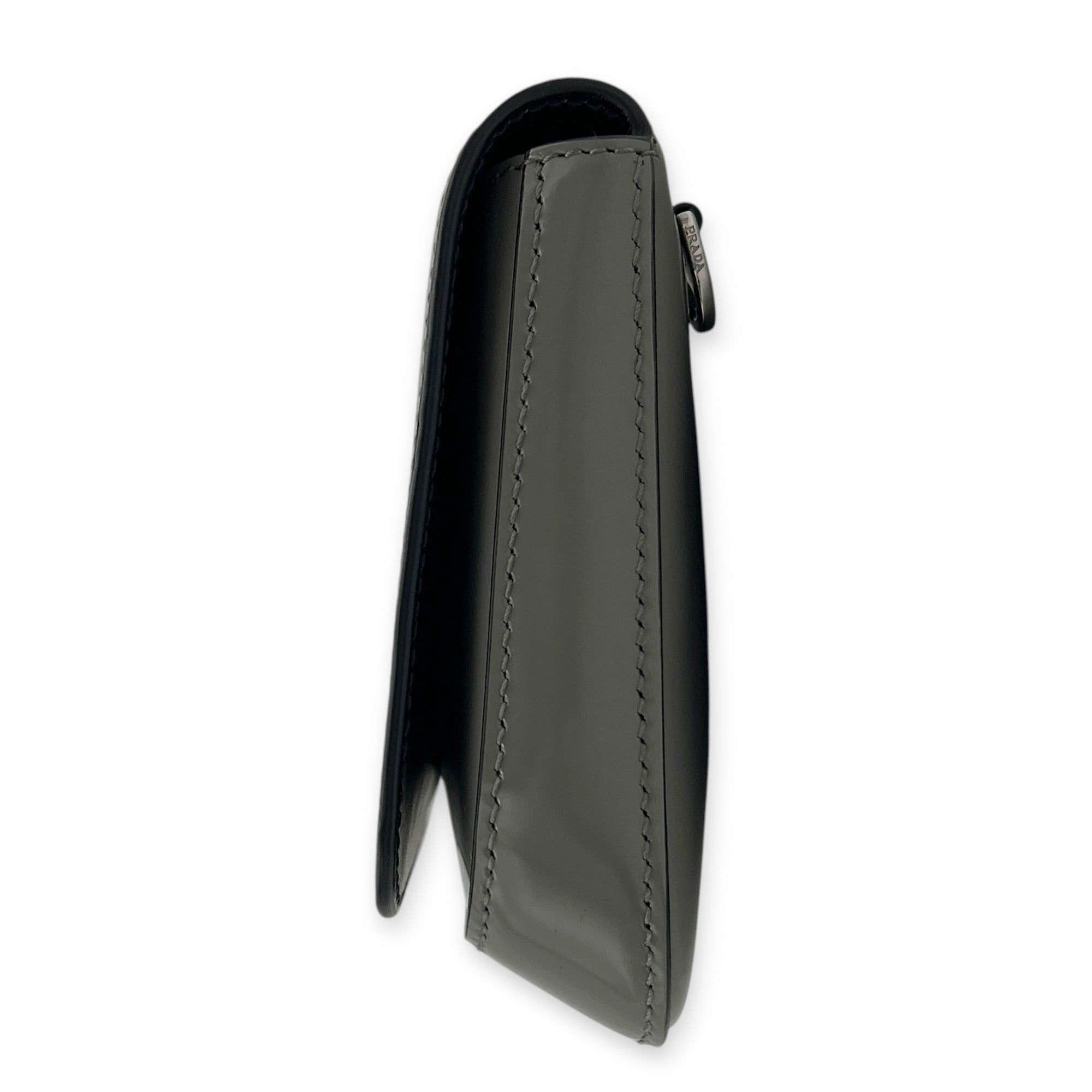 Prada Logo Crossbody Bag Grey in Patent Leather, Silver hardware (Category: Bags & Wallets) located in Singapore. Submitted by carousellluxury (Listing ID 1433497755, Image 4). Description: SKU C2604-011345AA Material Patent Leather Color Grey Hardware Silver Strap Included, detachable Dimension (L)18cm x (H)10cm x (W)7cm Accessories Dust Bag, Series 7/K Circa Est NA Microchipped FALSE Condition - Surface: In very good condition overall - Bottom 