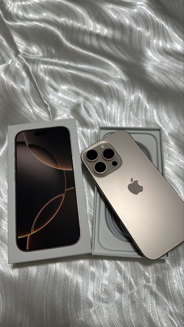 iPhone 16 Pro Desert Titanium 512GB (Category: iPhone 16 Series) located in Singapore. Submitted by naimialisa (Listing ID 1458959963, Image 1). Description: Bought in January 2025. No box Only wire charger ( wire is the original apple one. ) Everything else functional order. Recently only taken off the tempered glass but only micro scratches. .