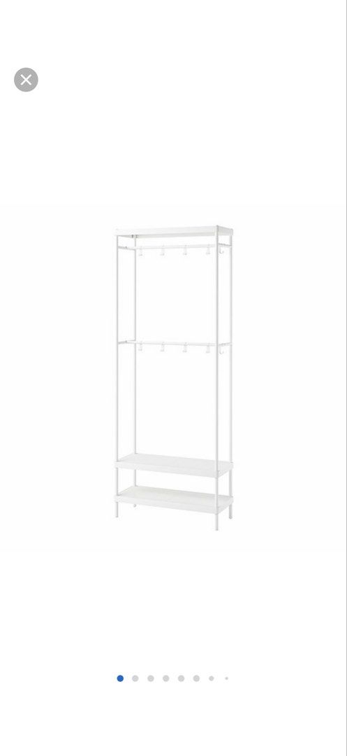 MACKAPAR White Metal Coat Rack with Shelves and Hooks (Category: Shelves, Cabinets & Racks) located in Singapore. Submitted by wanderlustxo (Listing ID 1459197778, Image 1). Description: - Modern white metal coat rack - Two shelves at the bottom for shoes or storage - Two rows of hooks at the top for coats and bags - Simple and modern design - Ideal for entryway or bedroom .