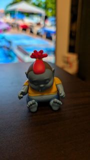 Cute Blue Monster Figurine with Red Hair
